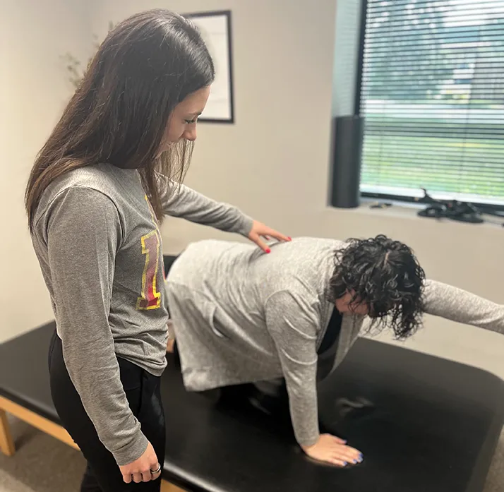 Chiropractor Cedar Rapids IA Sadie With Physical Rehab Patient